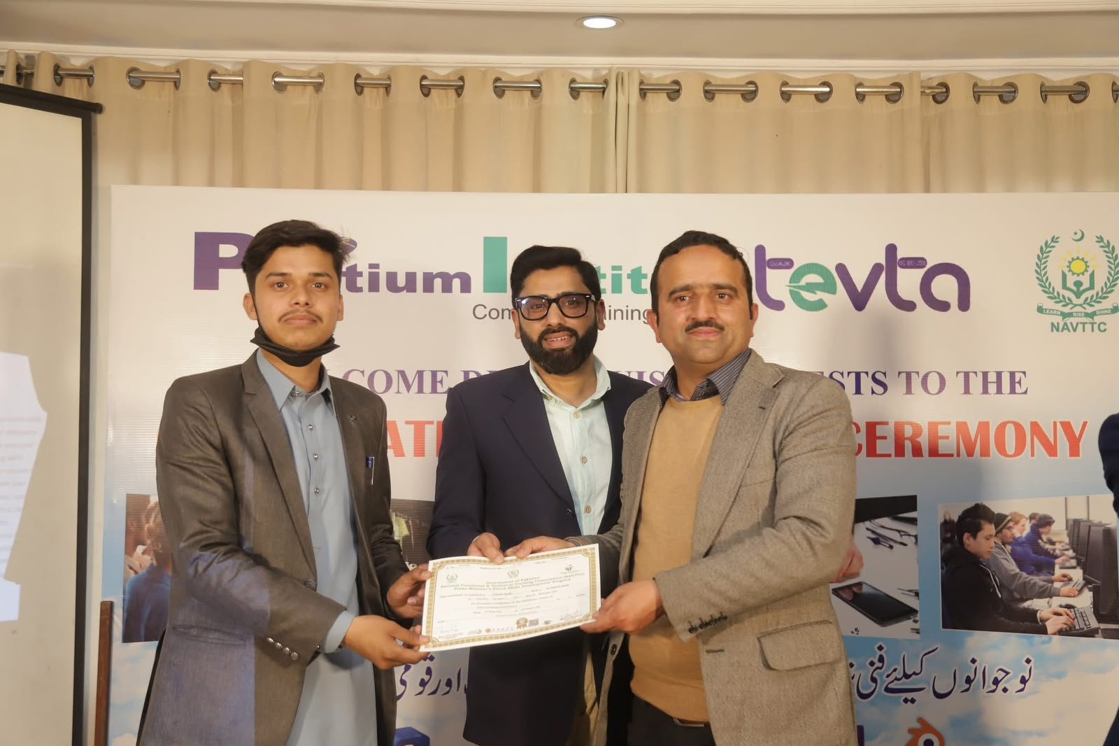 Certificate and shield distribution ceremony for NAVTTC Batch 1 students at Pentium Computer Training Institute, Muzaffarabad